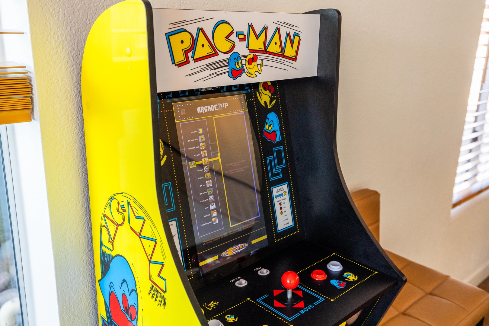 Classic arcade game! This retro Pac-Man machine offers nostalgic fun