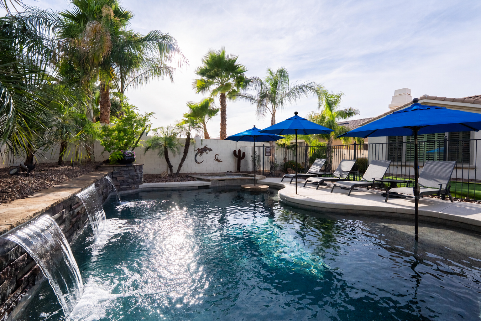 Sparkling heated pool with soul soothing waterfall
