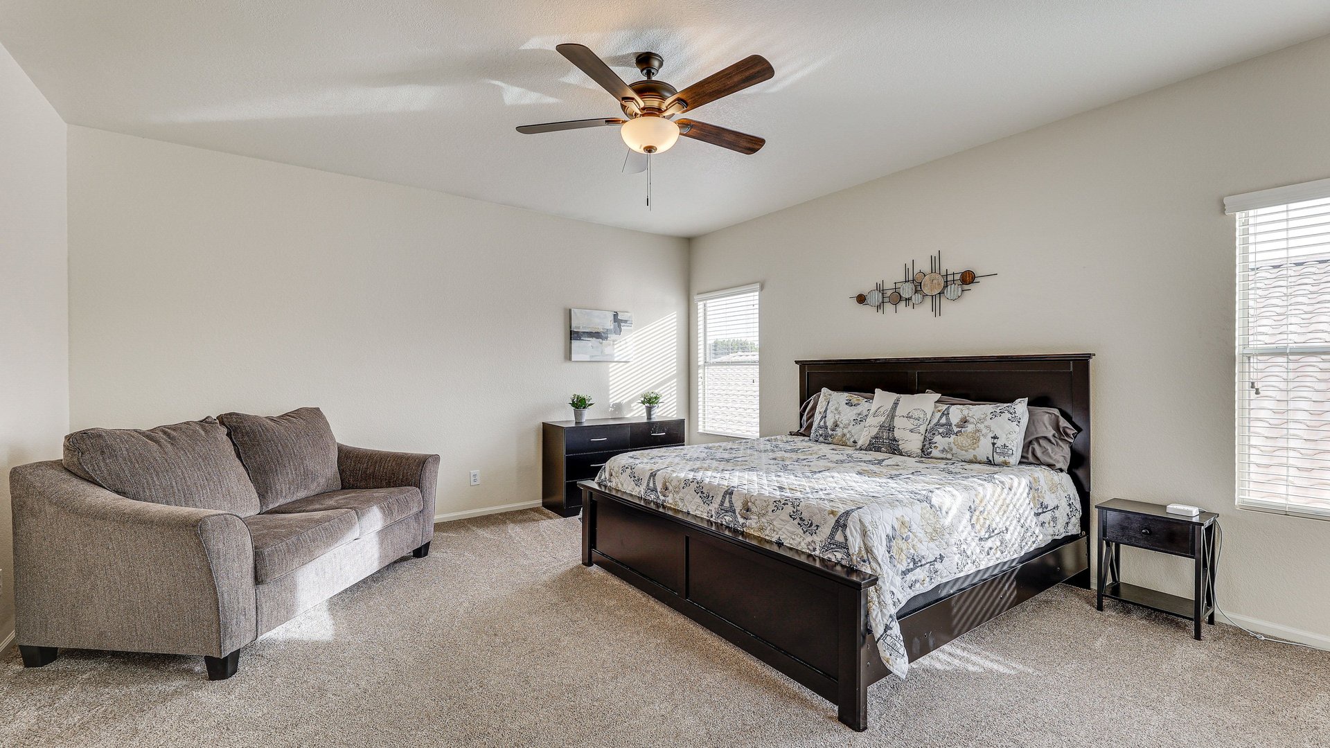 Relax in your spacious King bedroom featuring a plush sofa for lounging