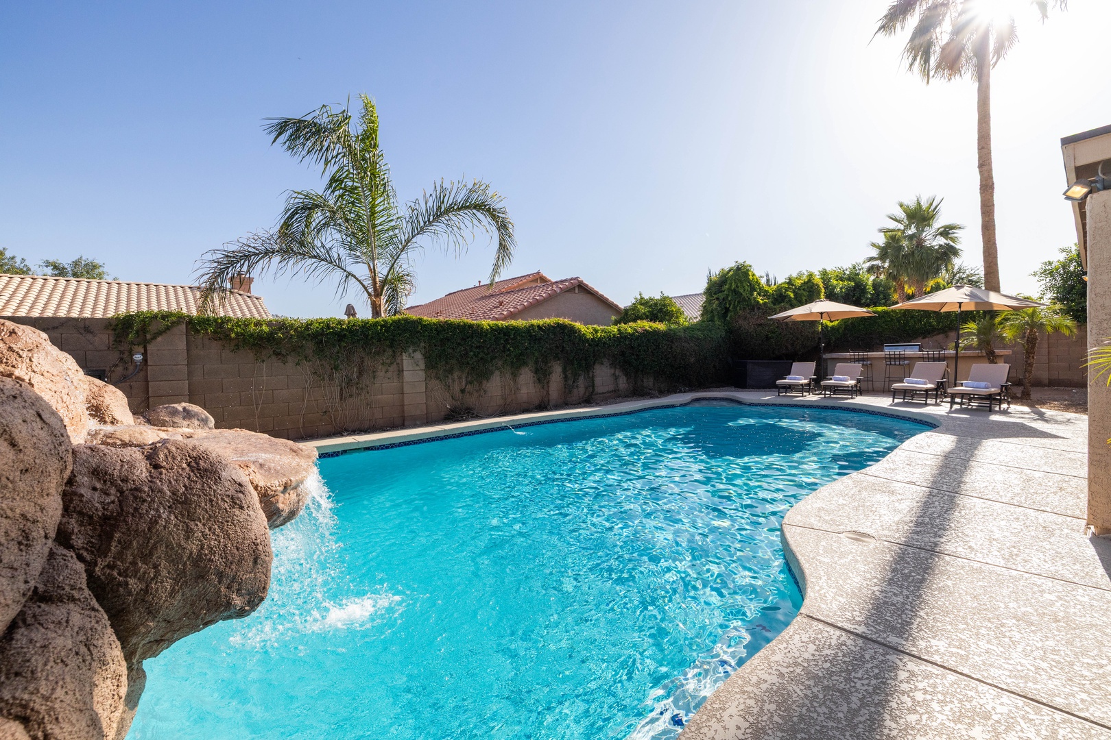 Heated pool, waterslide and waterfall