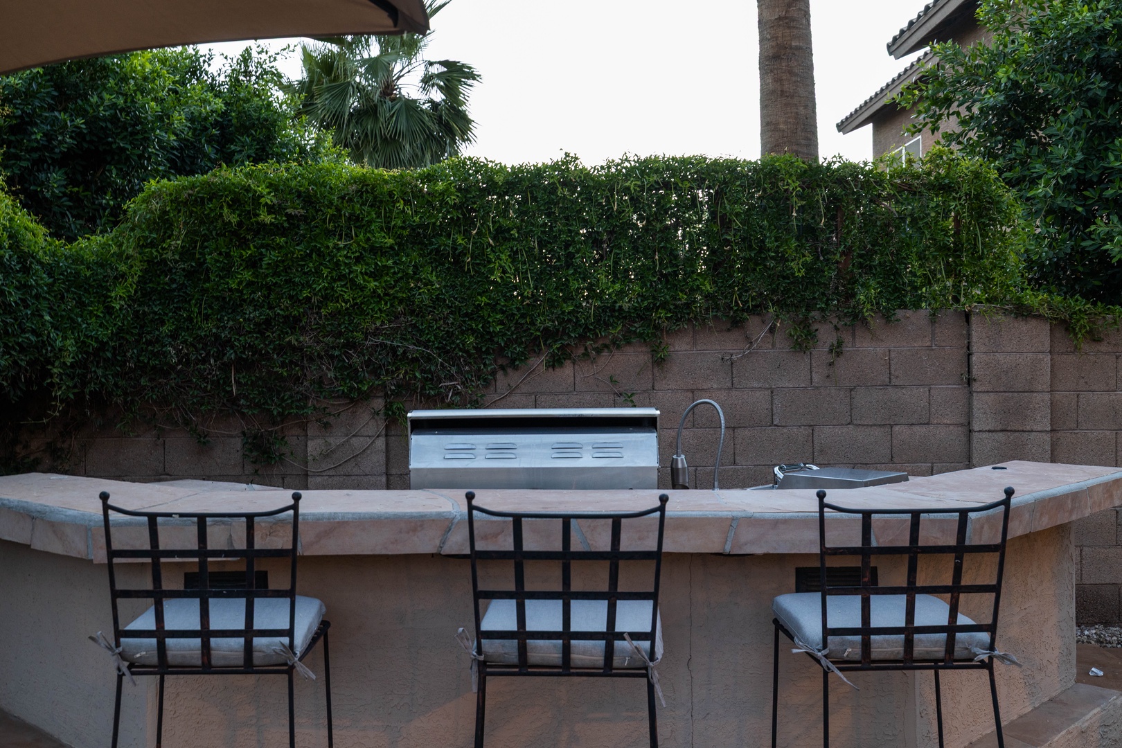 Outdoor counter seating by the BBQ