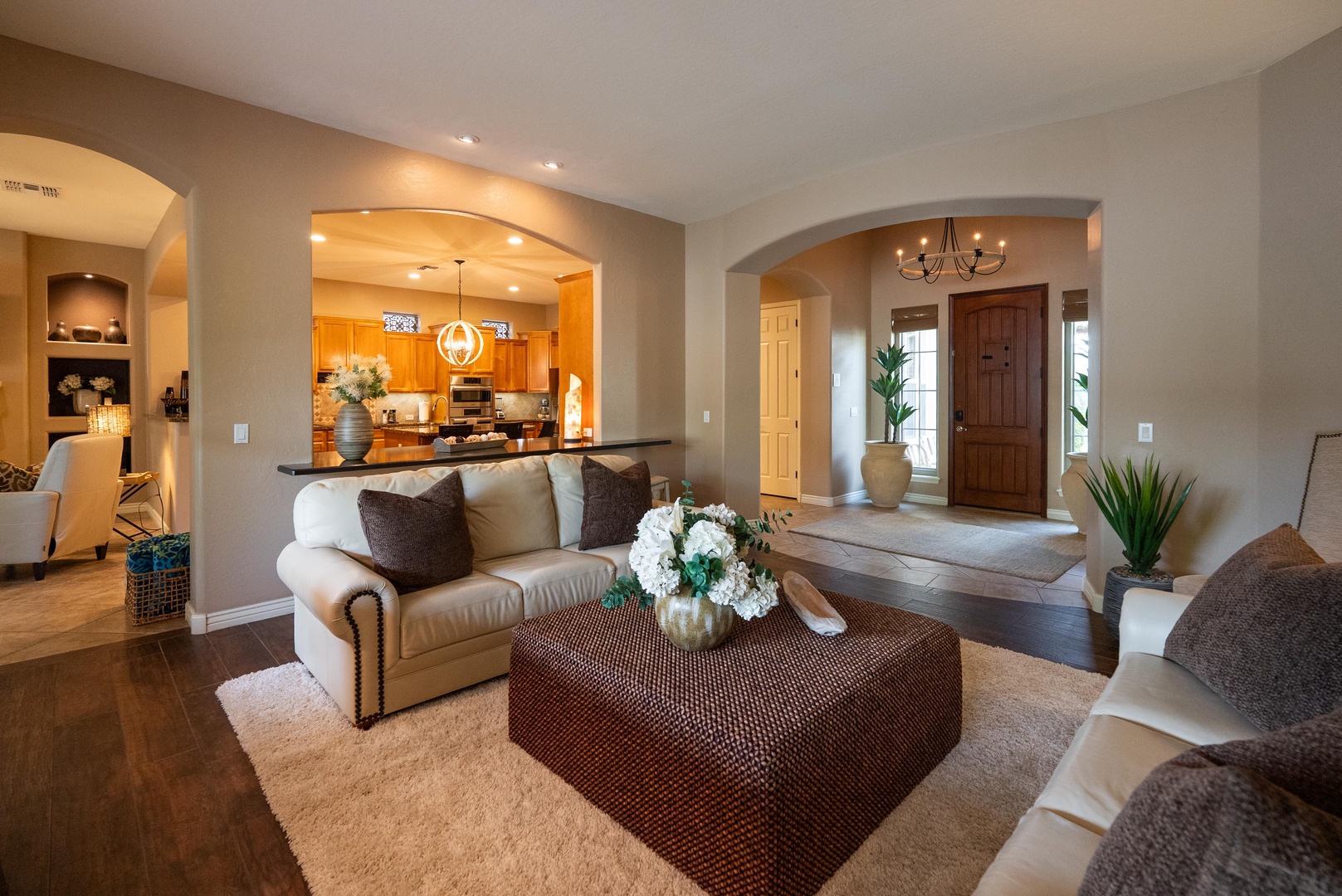 Open-concept living, kitchen and grand foyer