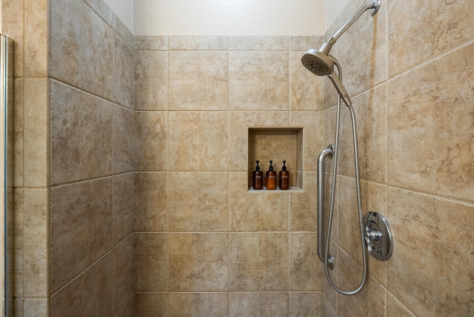Walk-in shower with grab bar