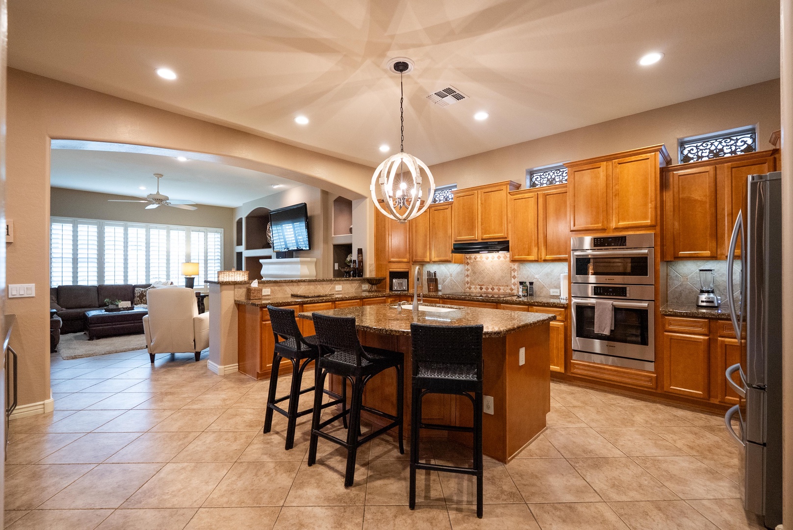 Gourmet kitchen with granite countertops and high end appliances