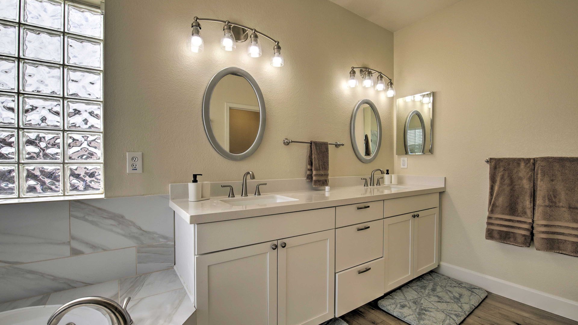 Indulge in your spacious master bathroom featuring