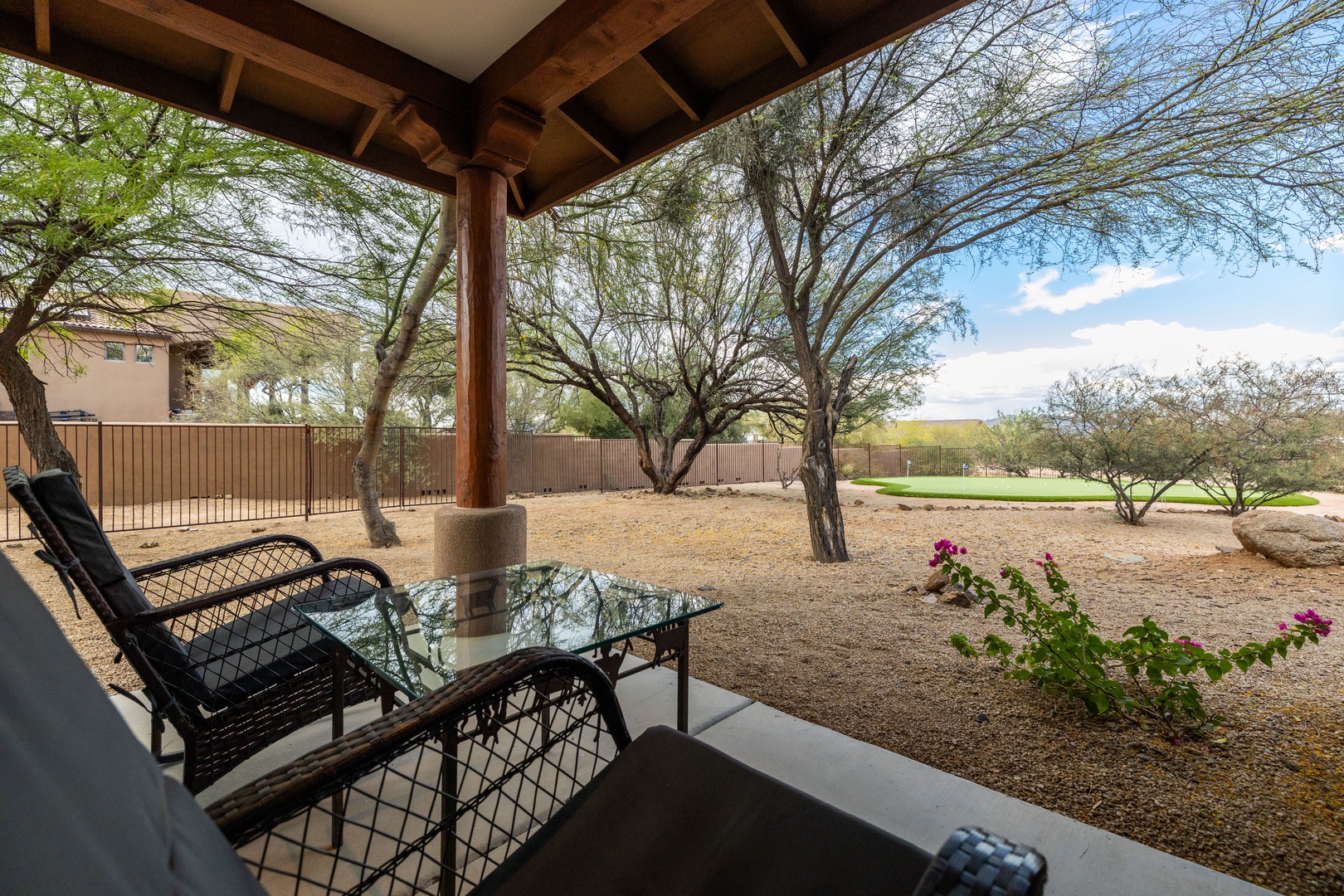 Guest bedroom private patio overlooking the putting green