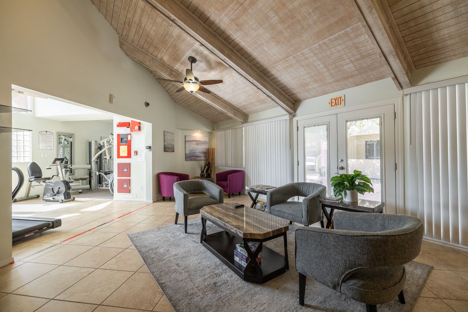 Relax in this spacious community lounge with comfortable seating