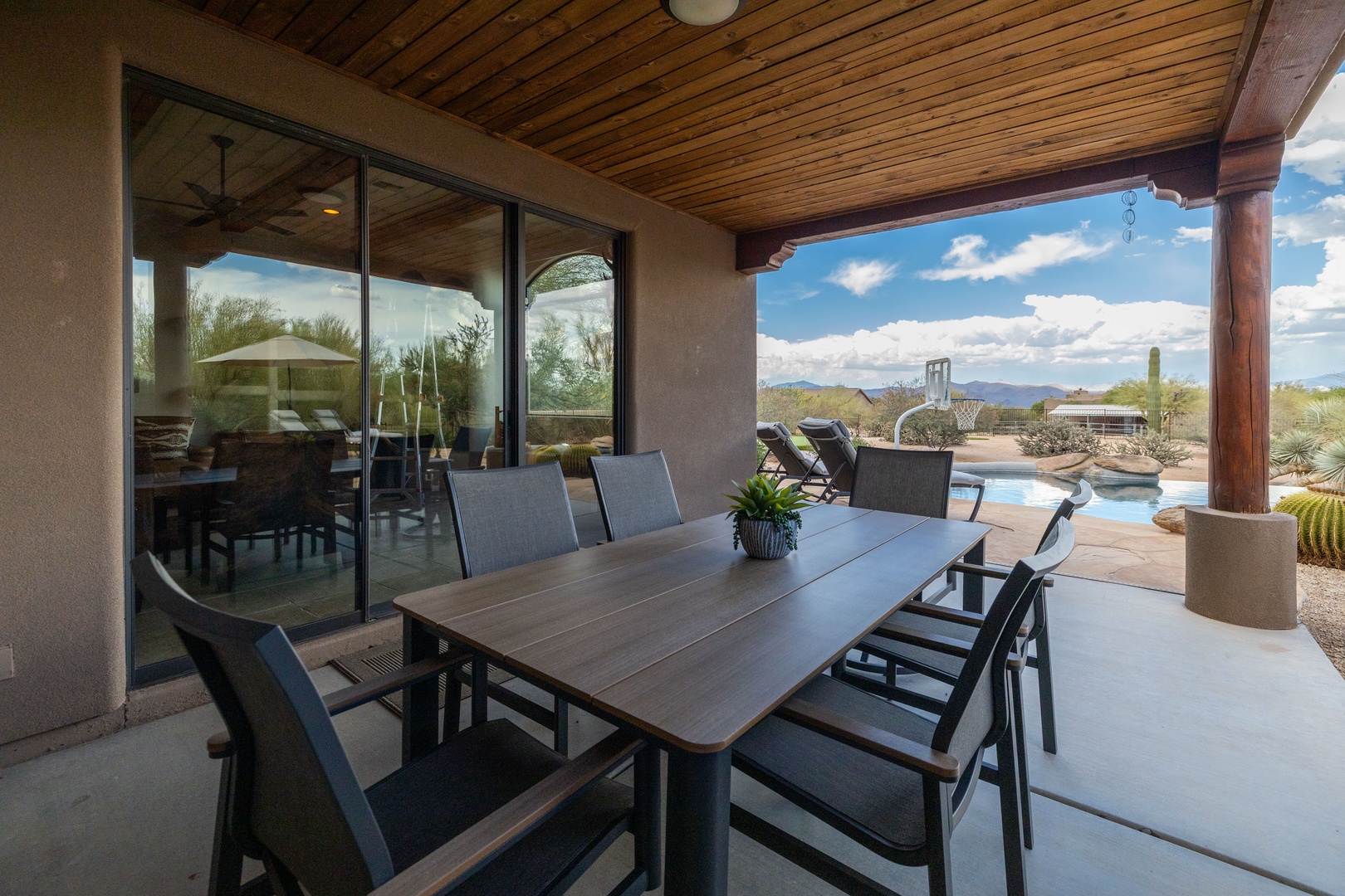 Outdoor dining overlooking the pool