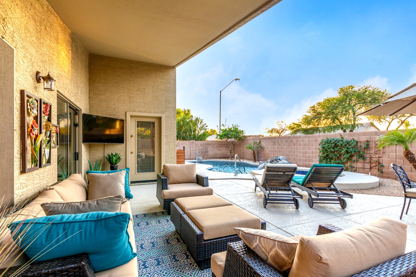Relax in the patio, overlooking the pool