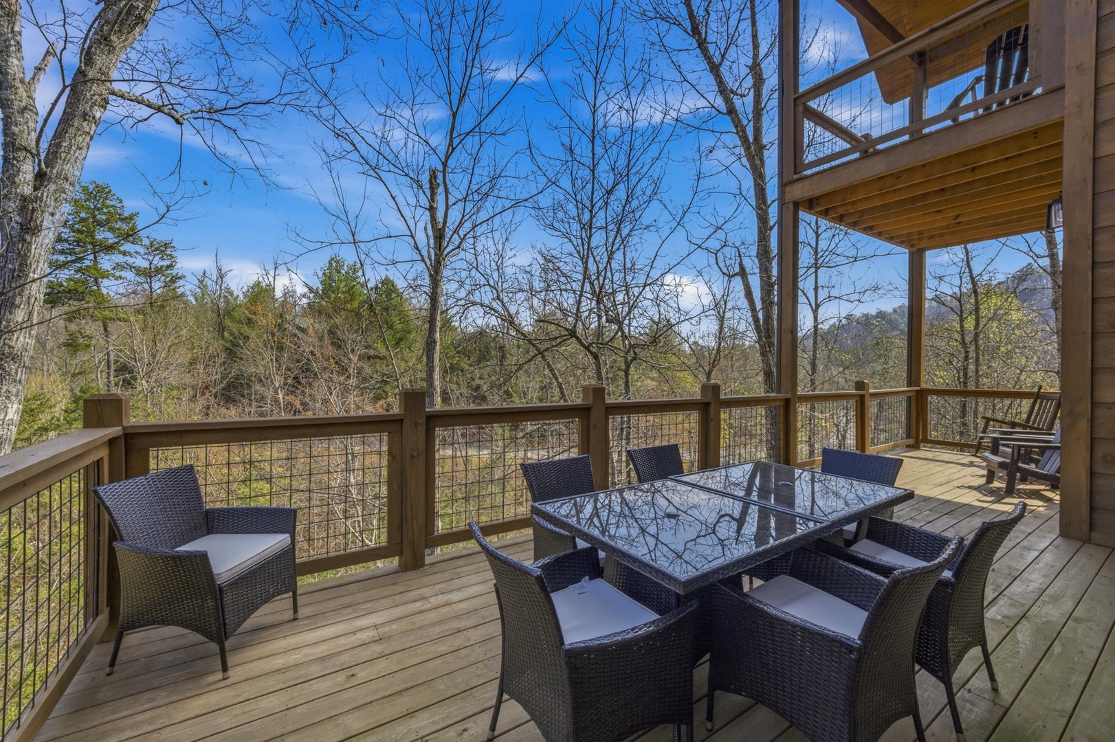 Savor morning coffee on your private deck with forest views and mountain vistas stretching beyond.