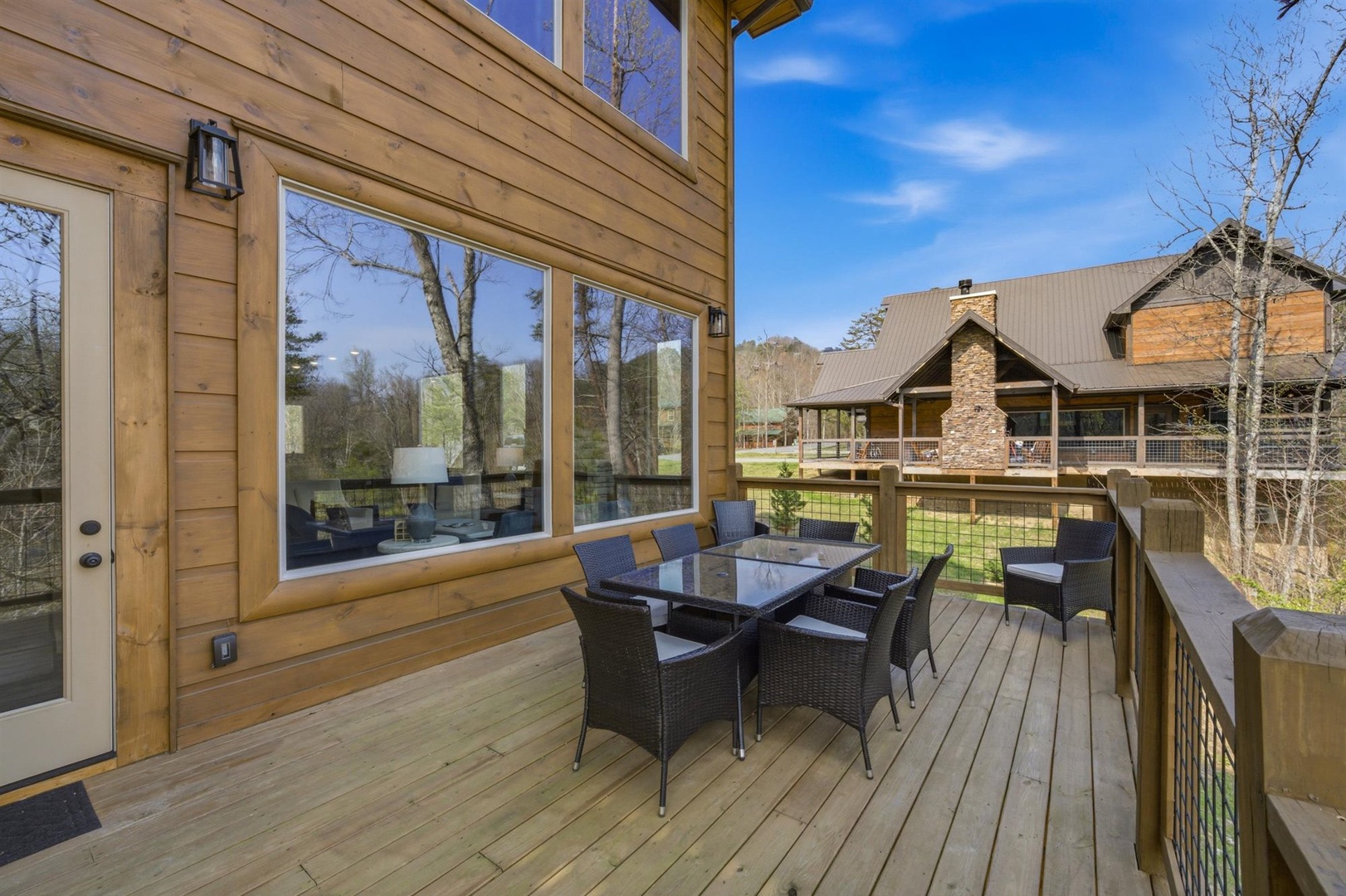 Step onto your private deck where morning coffee tastes better surrounded by nature's beauty and peaceful mountain views.