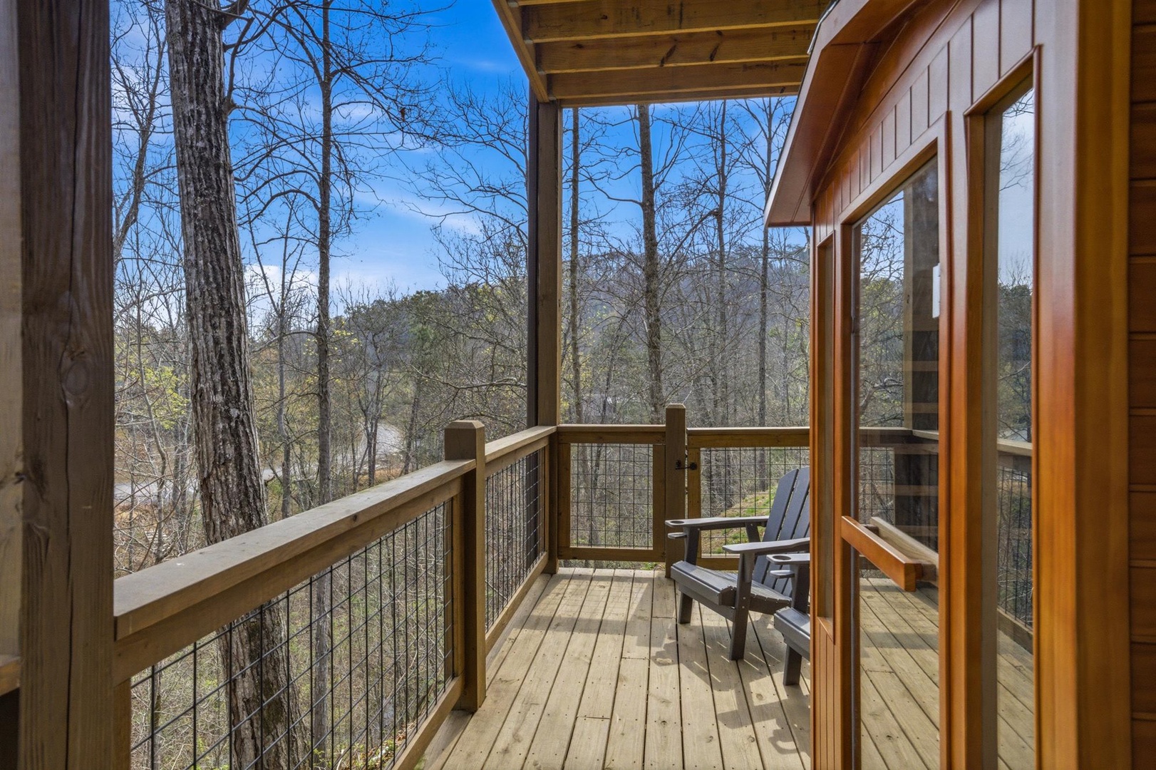 Step onto your private deck and breathe in the fresh forest air while soaking up peaceful woodland views from your comfortable chair.