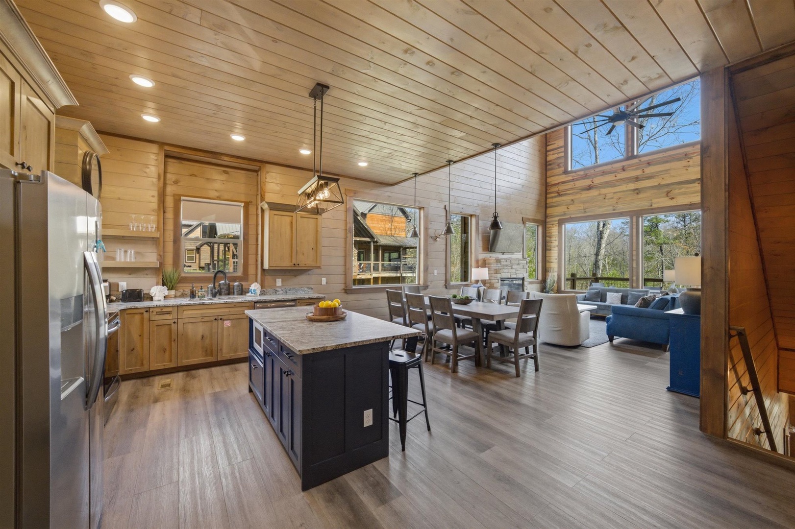 Your spacious open-concept kitchen flows seamlessly into the dining and living areas, perfect for gathering with loved ones.