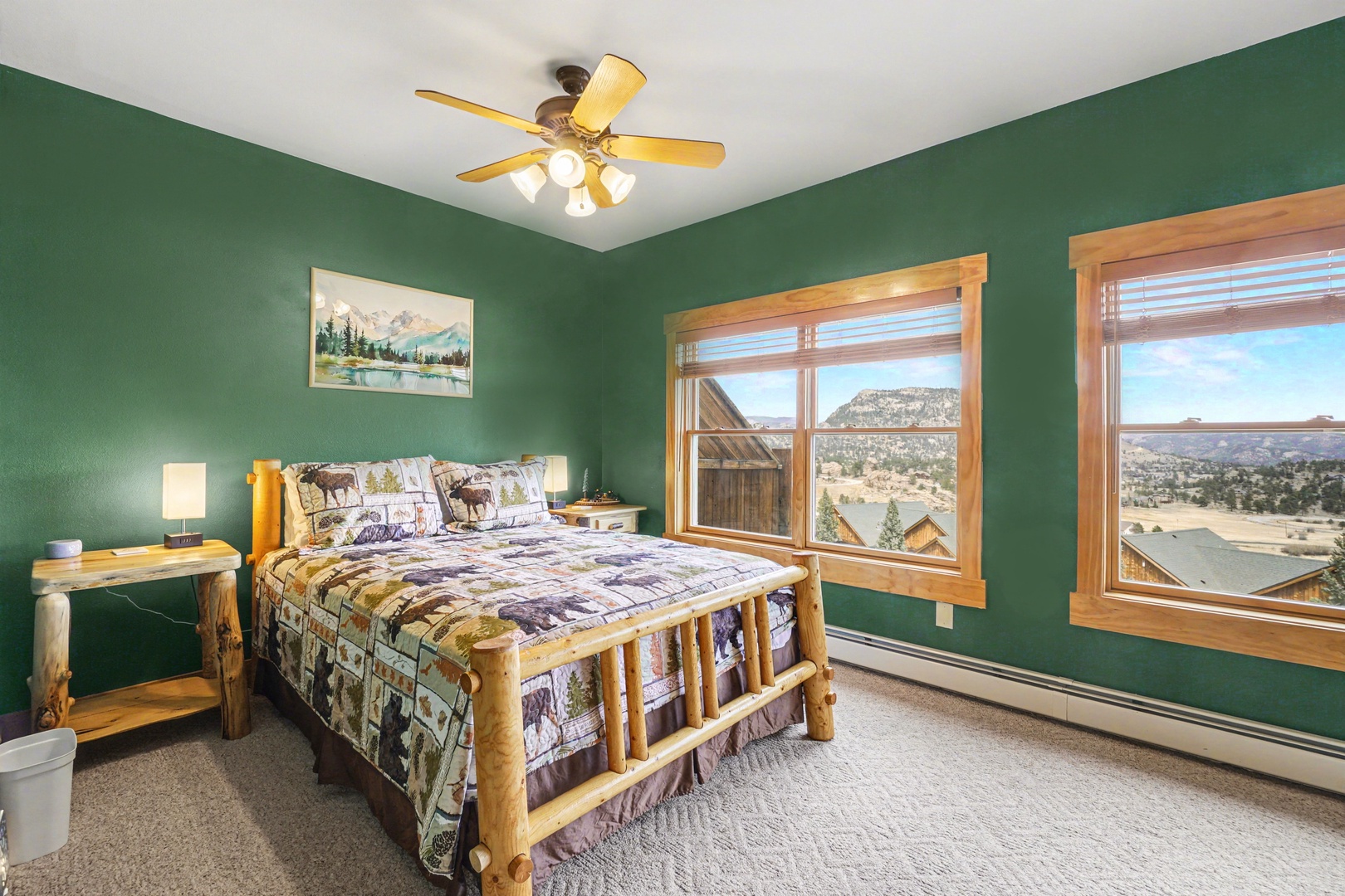 Wake up to stunning mountain vistas from your cozy log-style bed in this green sanctuary with panoramic windows.