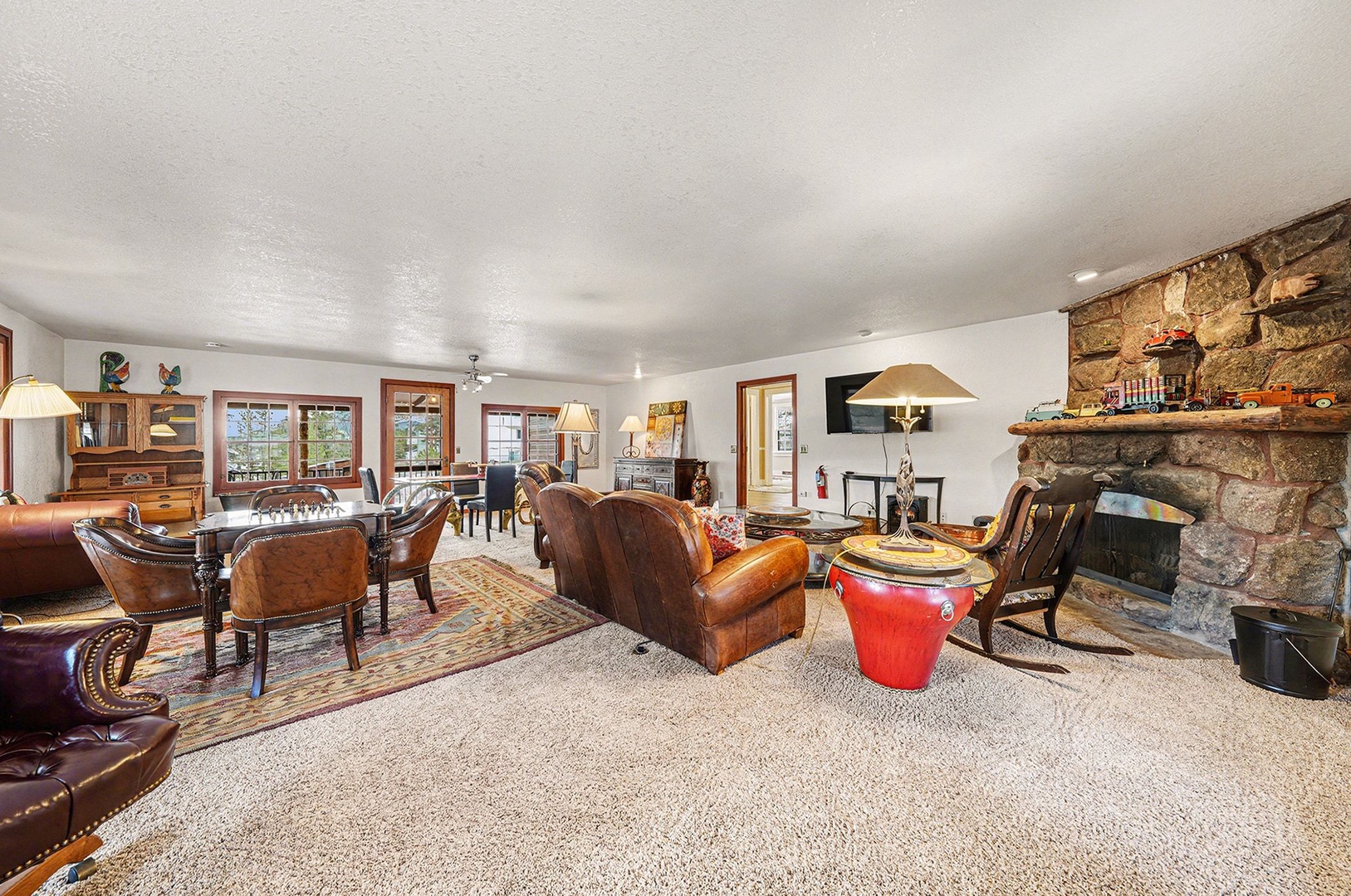 Twin Fawns living room game table fireplace