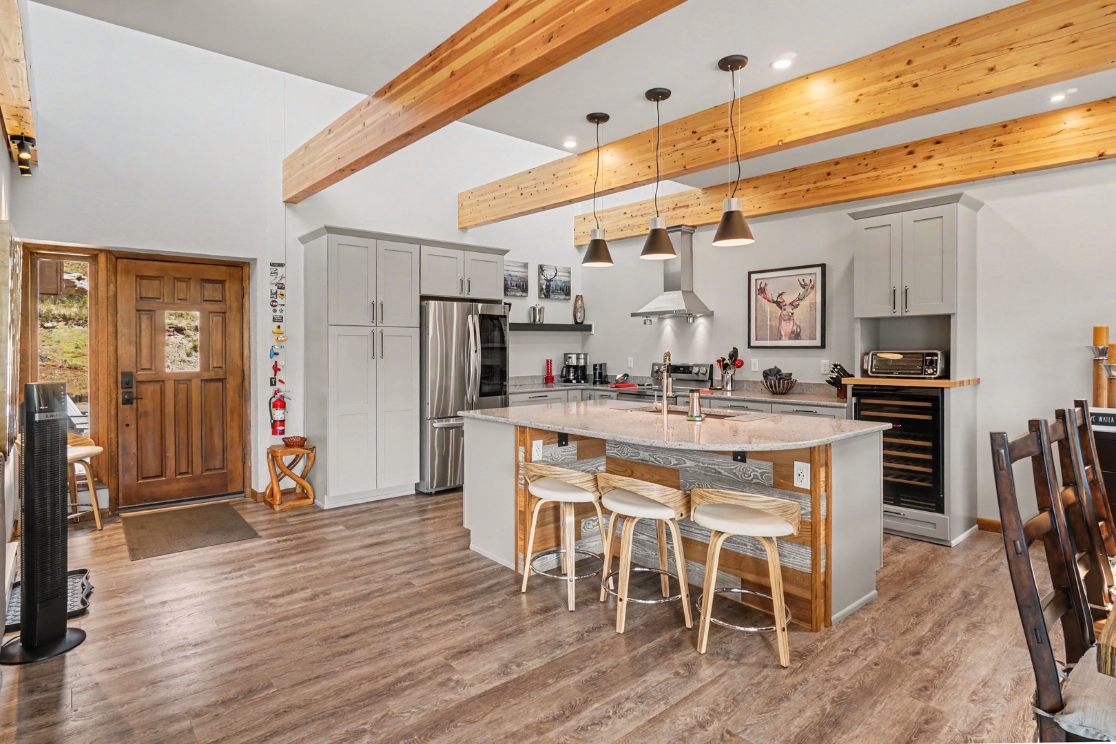 Your spacious kitchen welcomes you with a large island for gathering, and modern appliances ready for meal prep.