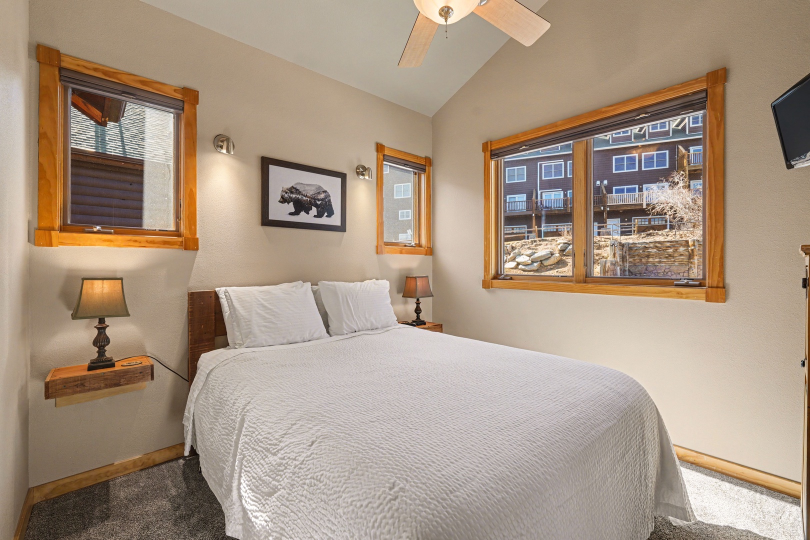 Rest peacefully in this cozy second bedroom with queen size bed