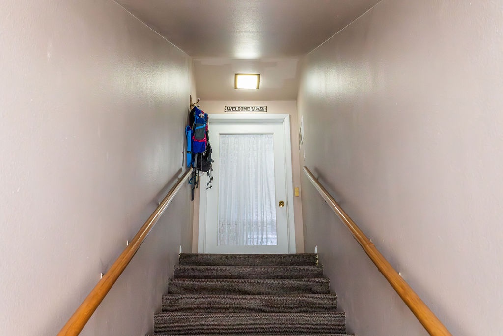 Step up to your welcoming entrance with sturdy handrails guiding your way to comfort.