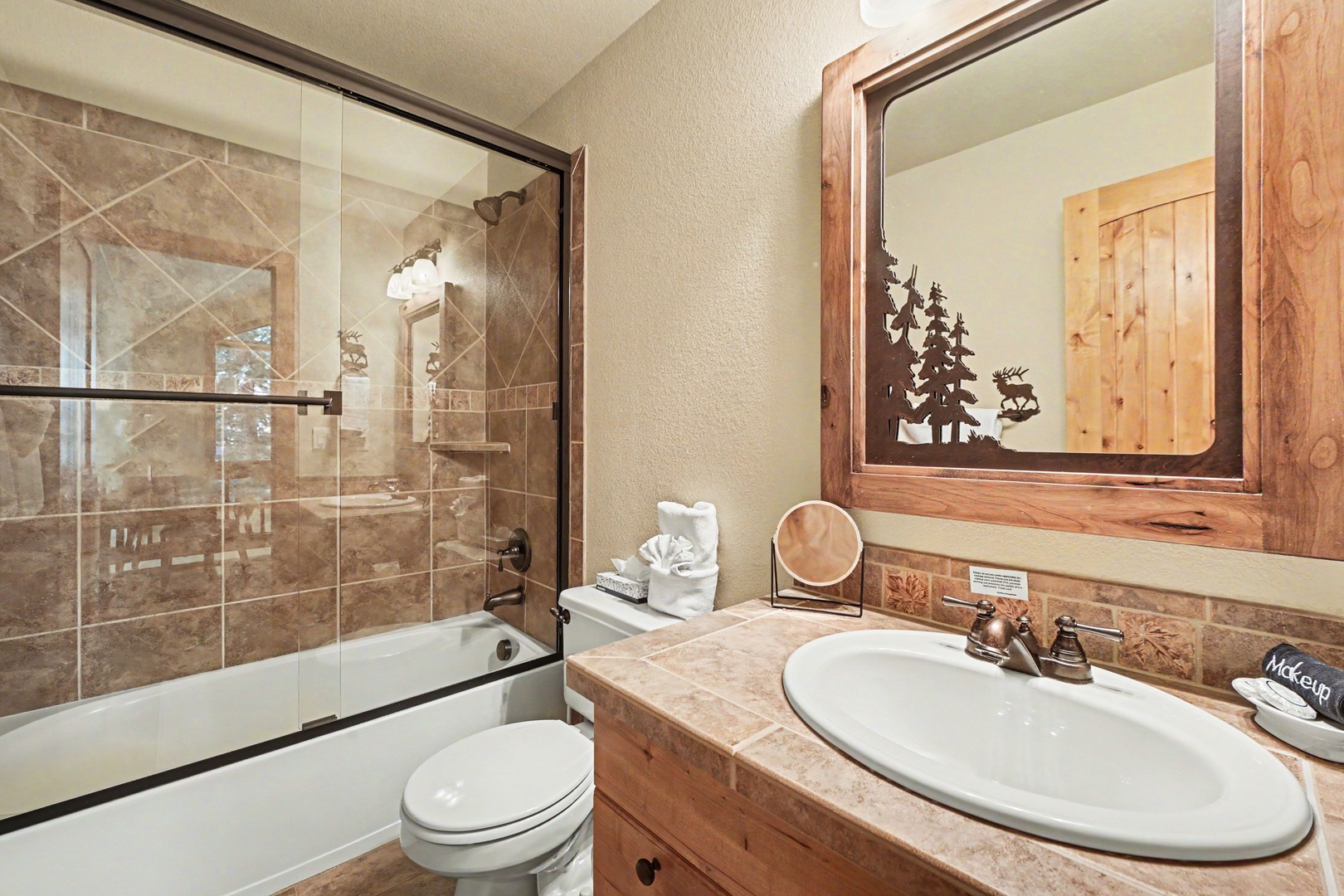 Upper level bathroom with tub/shower combo.