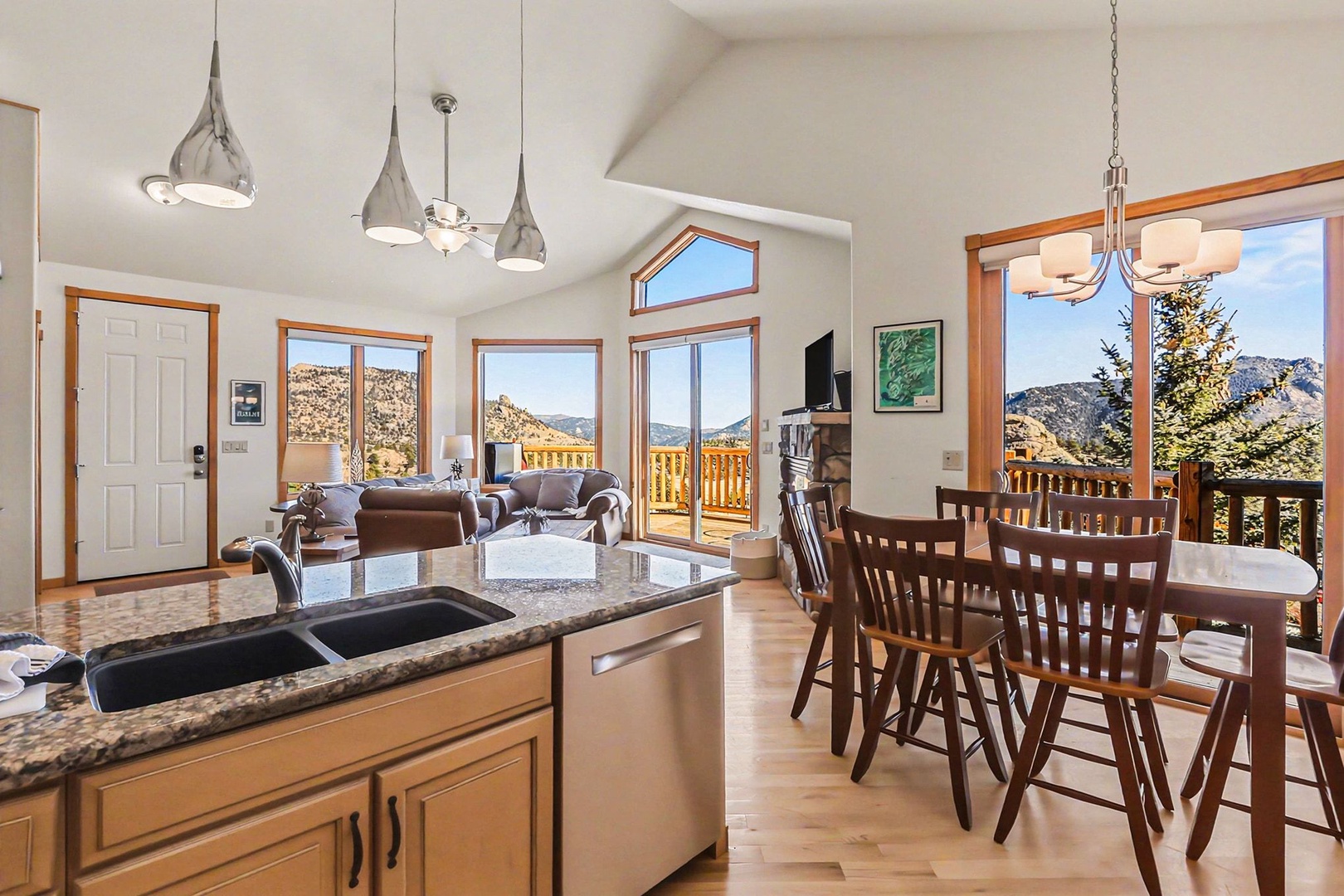 Relax in this bright, open-concept retreat where soaring ceilings and stunning mountain views create your perfect alpine escape.