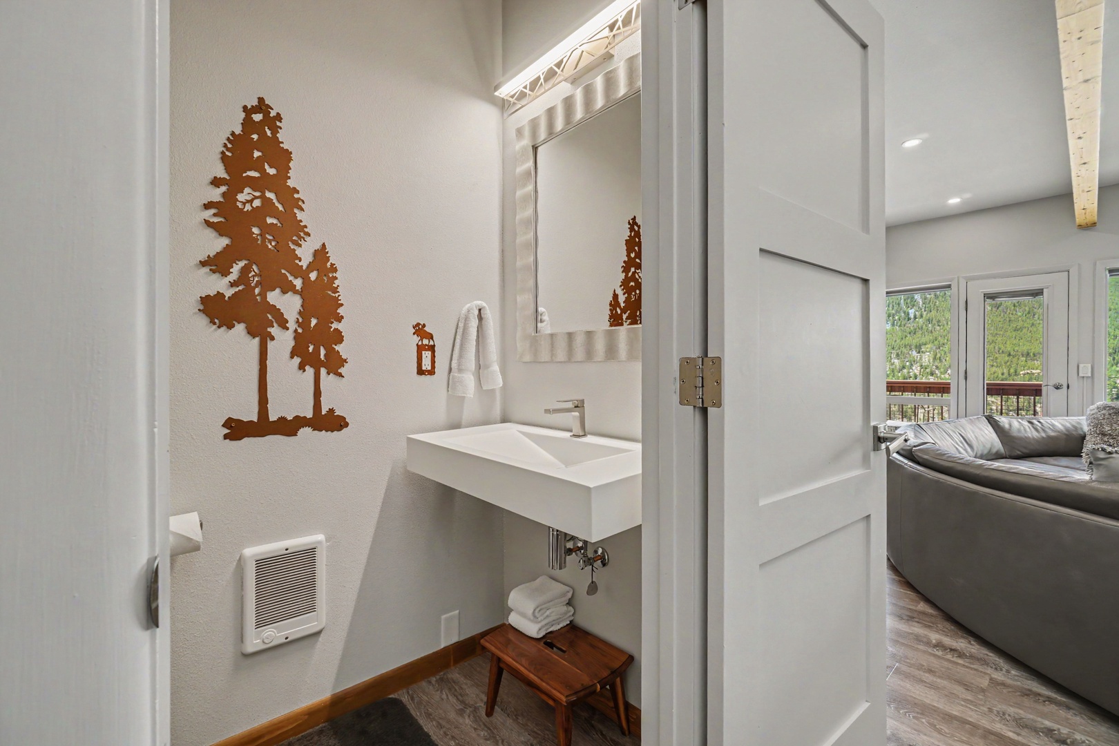 Freshen up in this charming powder room.