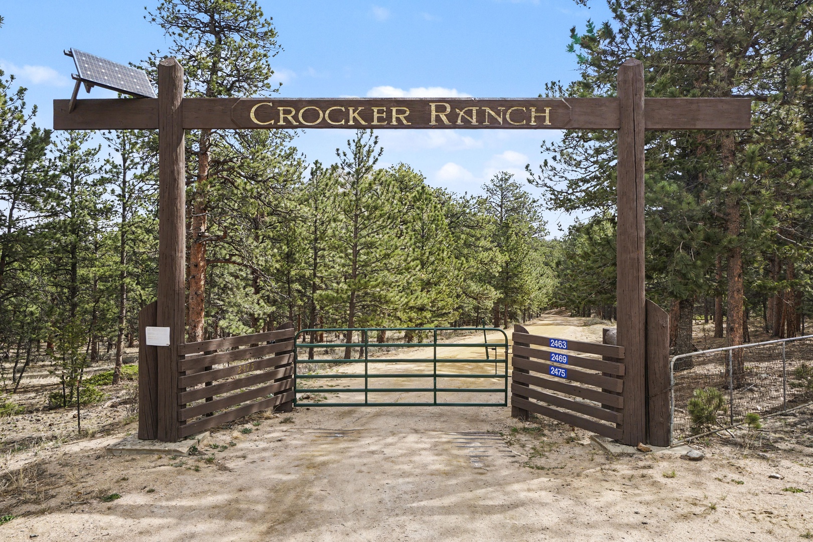 Welcome to Crocker Ranch, where rustic charm meets mountain serenity. This gated entrance sets the tone for an authentic ranch experience.