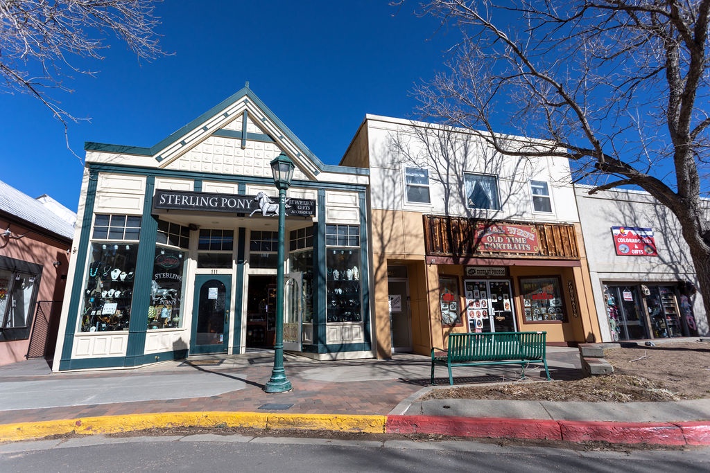 Historic storefronts line this charming main street, featuring local shops and authentic Western architecture.