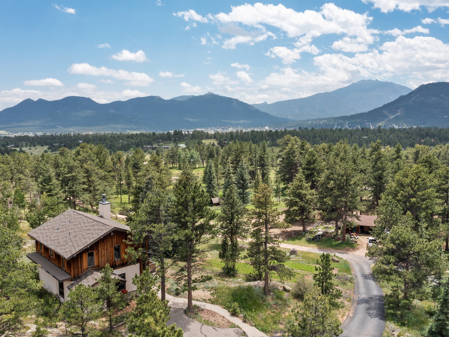 Stunning mountain retreat nestled among towering pines with breathtaking valley views and peaceful forest surroundings.