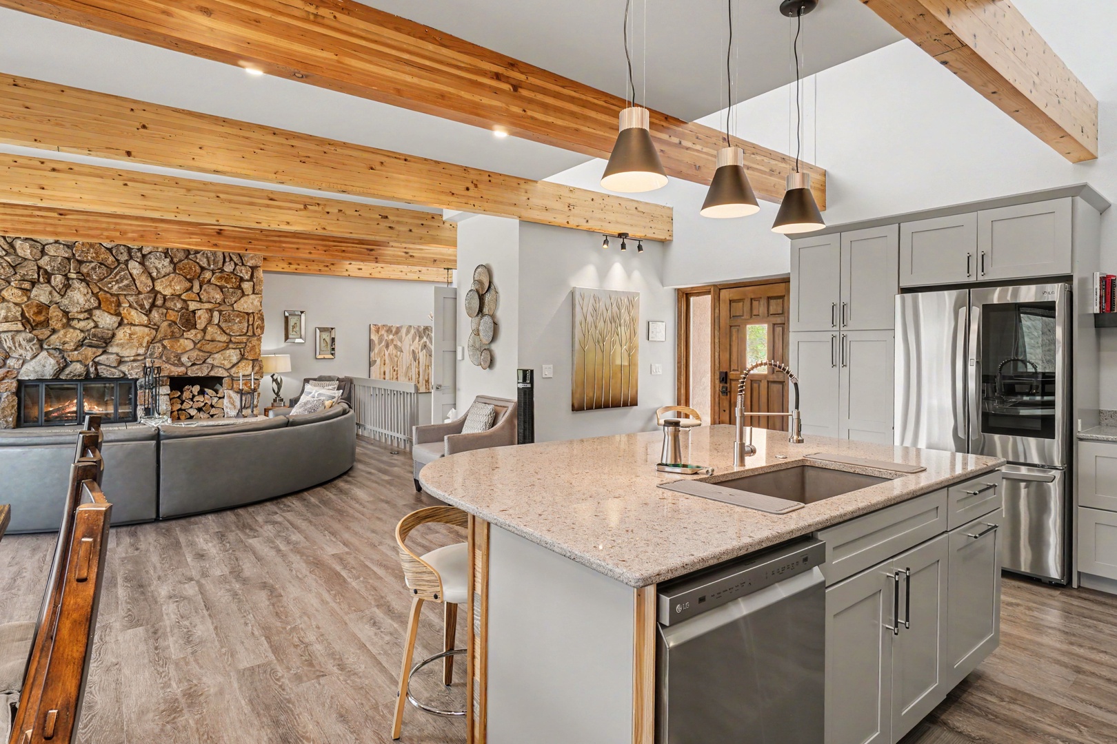 Guests can gather around the granite island as you prepare meals.