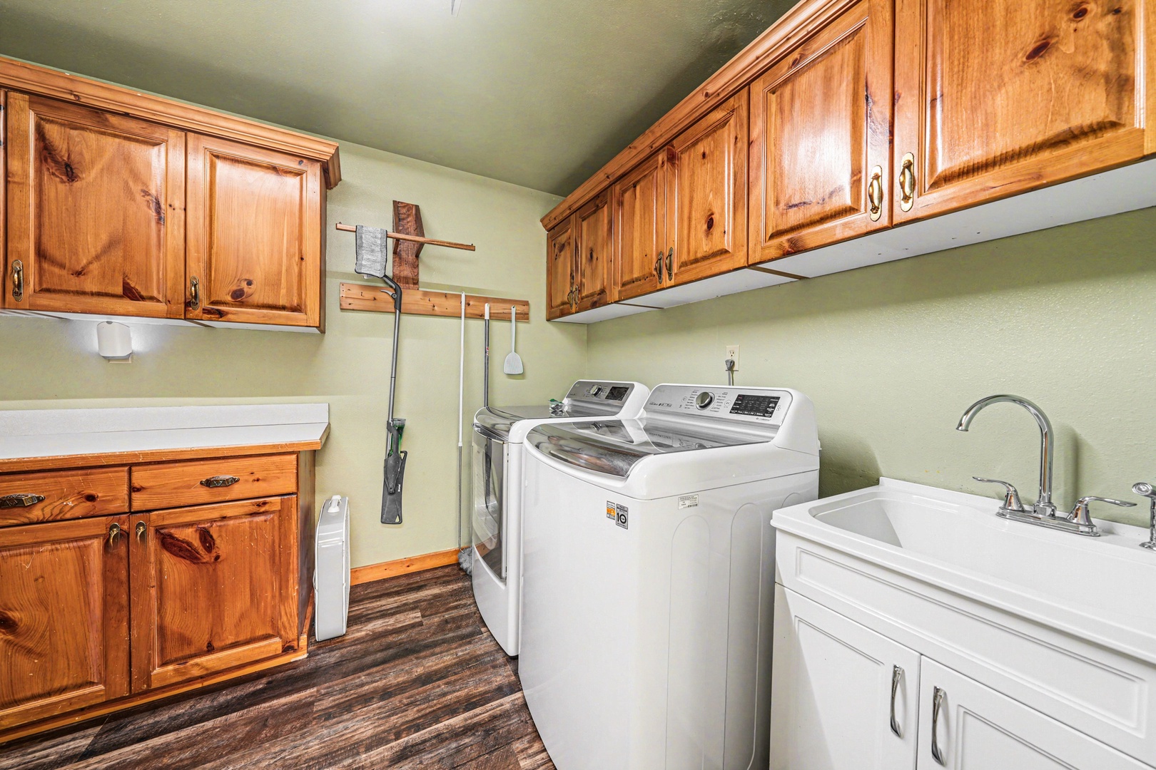Your own dedicated laundry room with full-size washer and dryer, plus plenty of cabinet storage for all your vacation essentials.