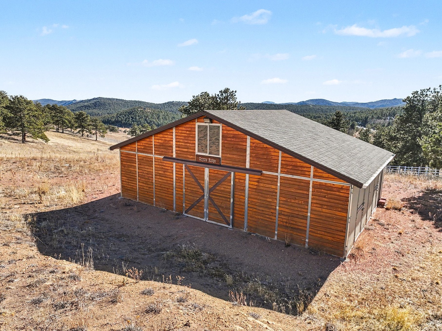 Many outbuildings on this beautiful 61 acre property!