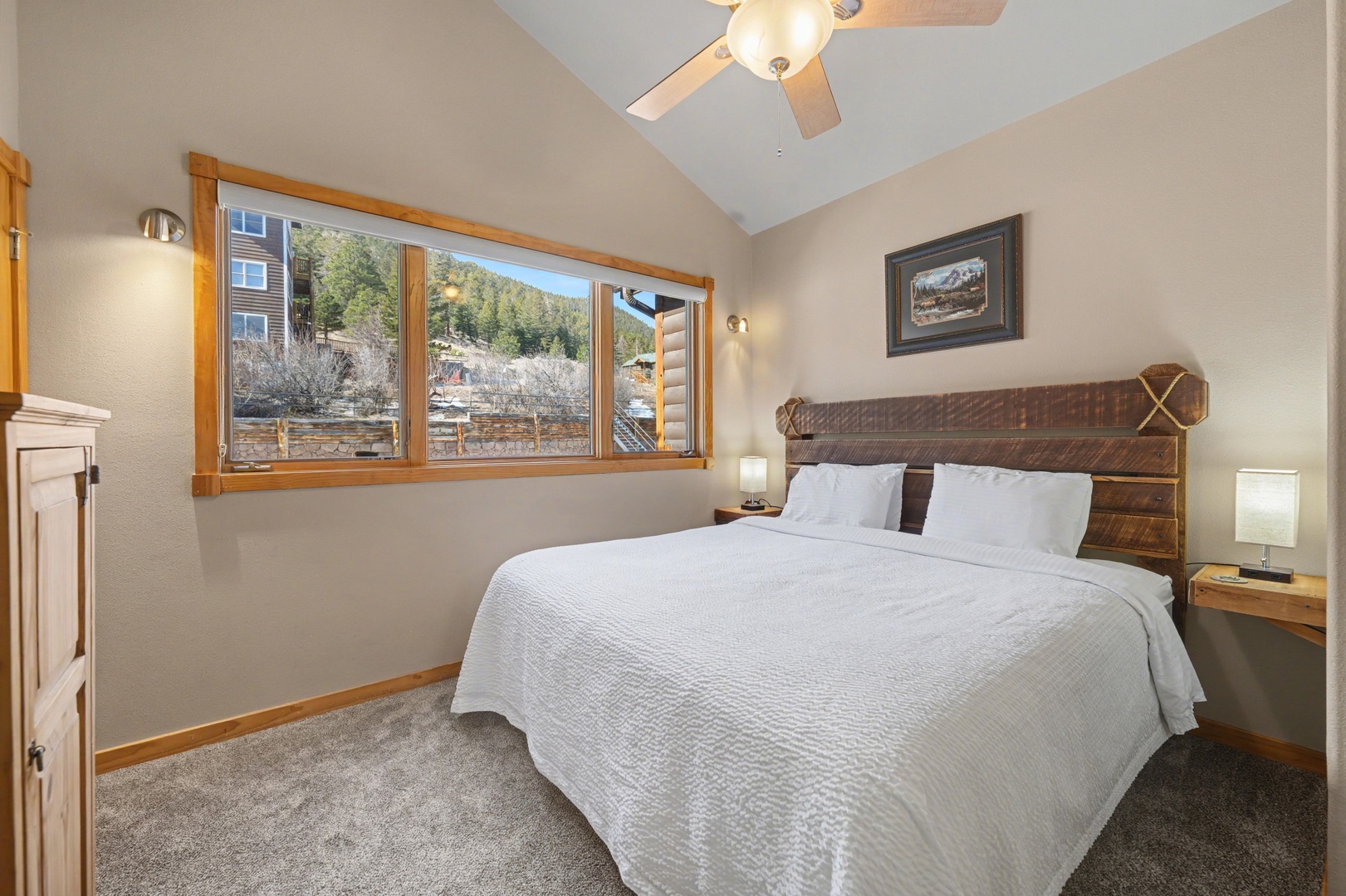 Rest and rejuvenate in this cozy primary bedroom with king bed and ensuite bathroom