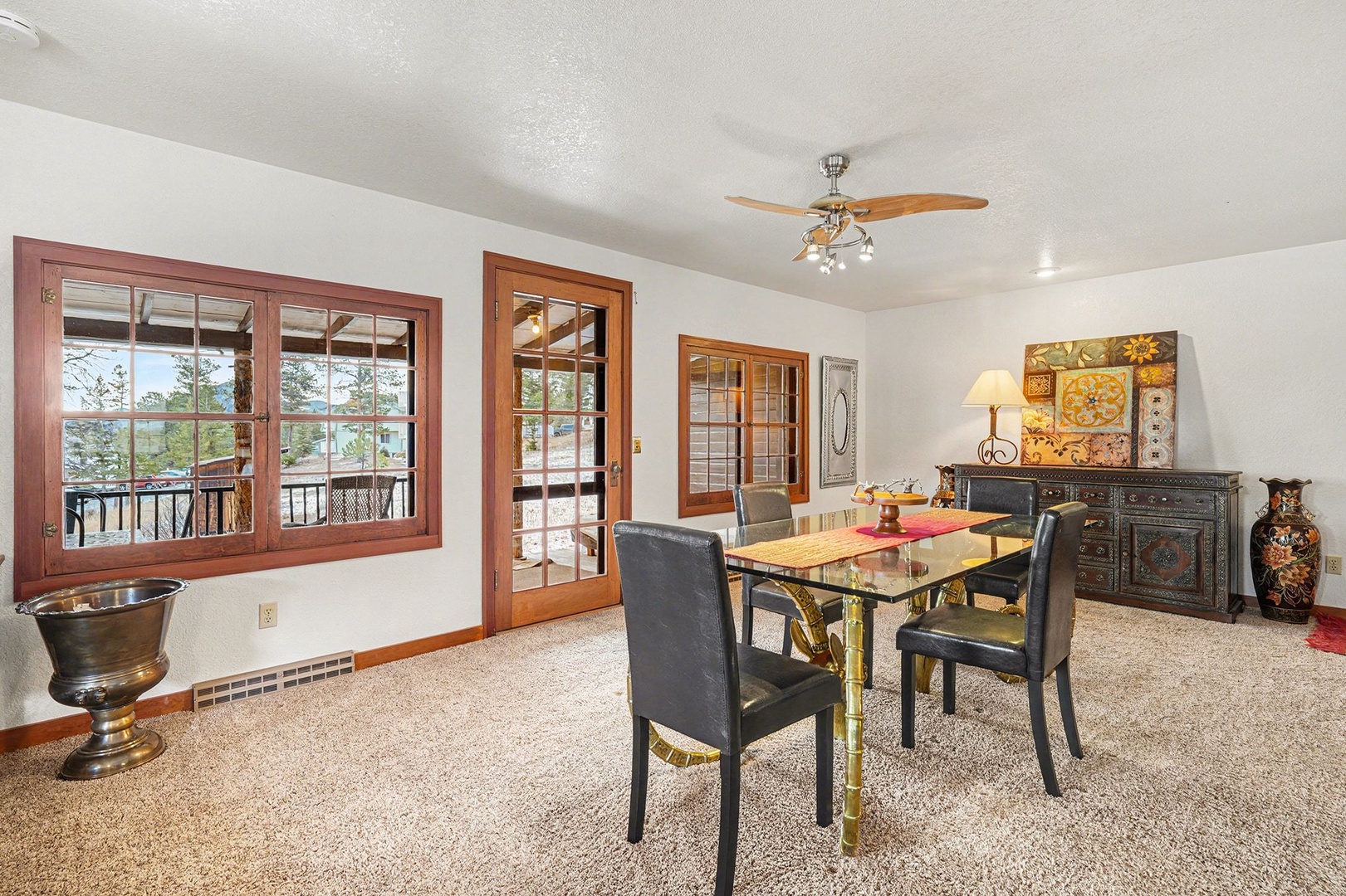 Twin Fawns dining table and door to deck