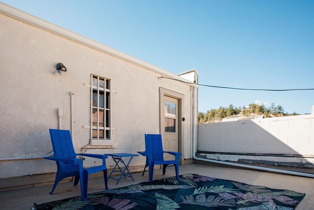 Your private rooftop patio offers weatherproof seating and a peaceful outdoor space for morning coffee or evening relaxation.