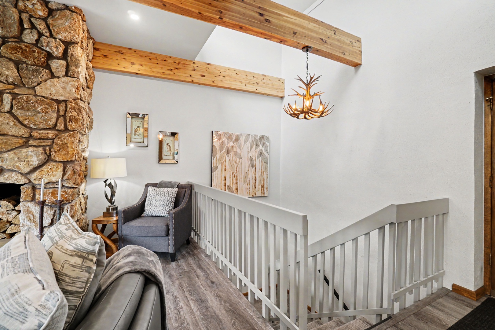 Head down the first set of carpeted switchback stairs to explore the mid and lower levels.