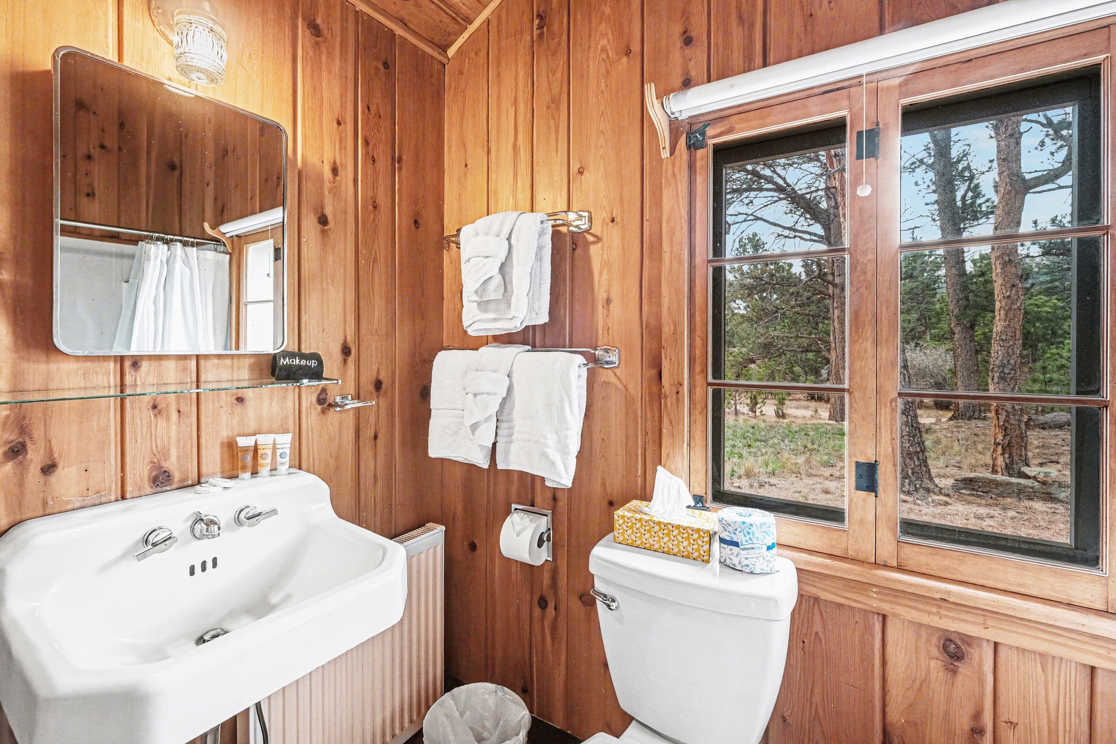 Rustic charm meets modern comfort in your private bathroom with a tub/shower combo.