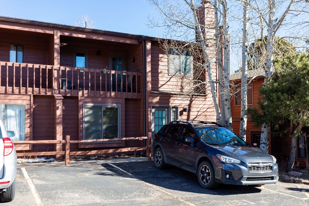 Multi-level wooden lodge with convenient parking and mountain lodge charm surrounded by aspens.