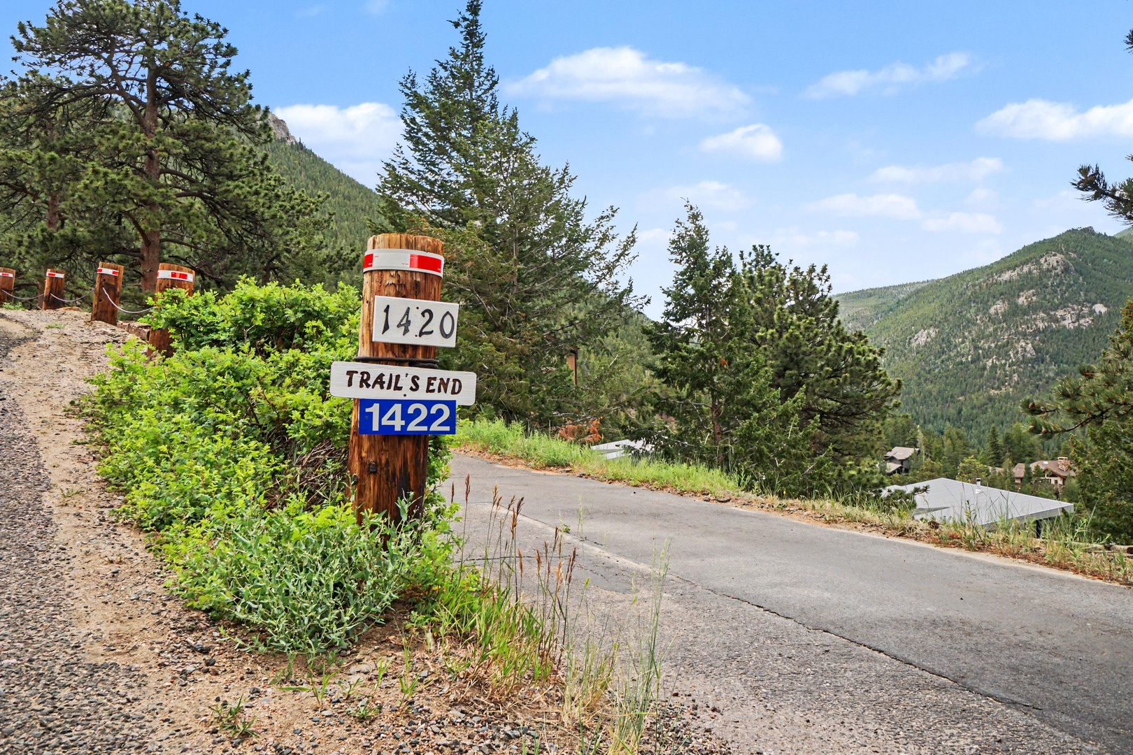 The Trail's End sign at driveway welcomes your arrival.