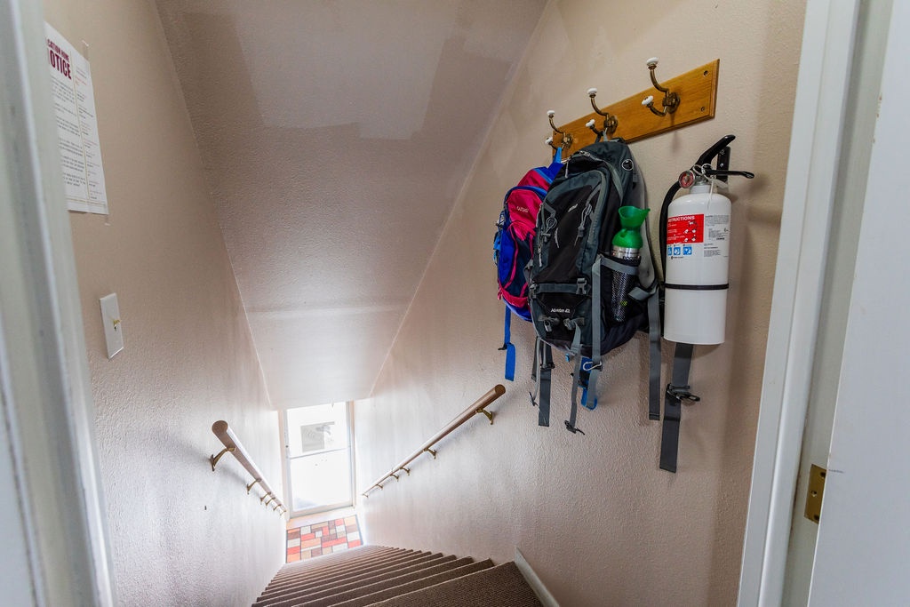 Secure entry and stairway leading up from the main street to your front entrance.