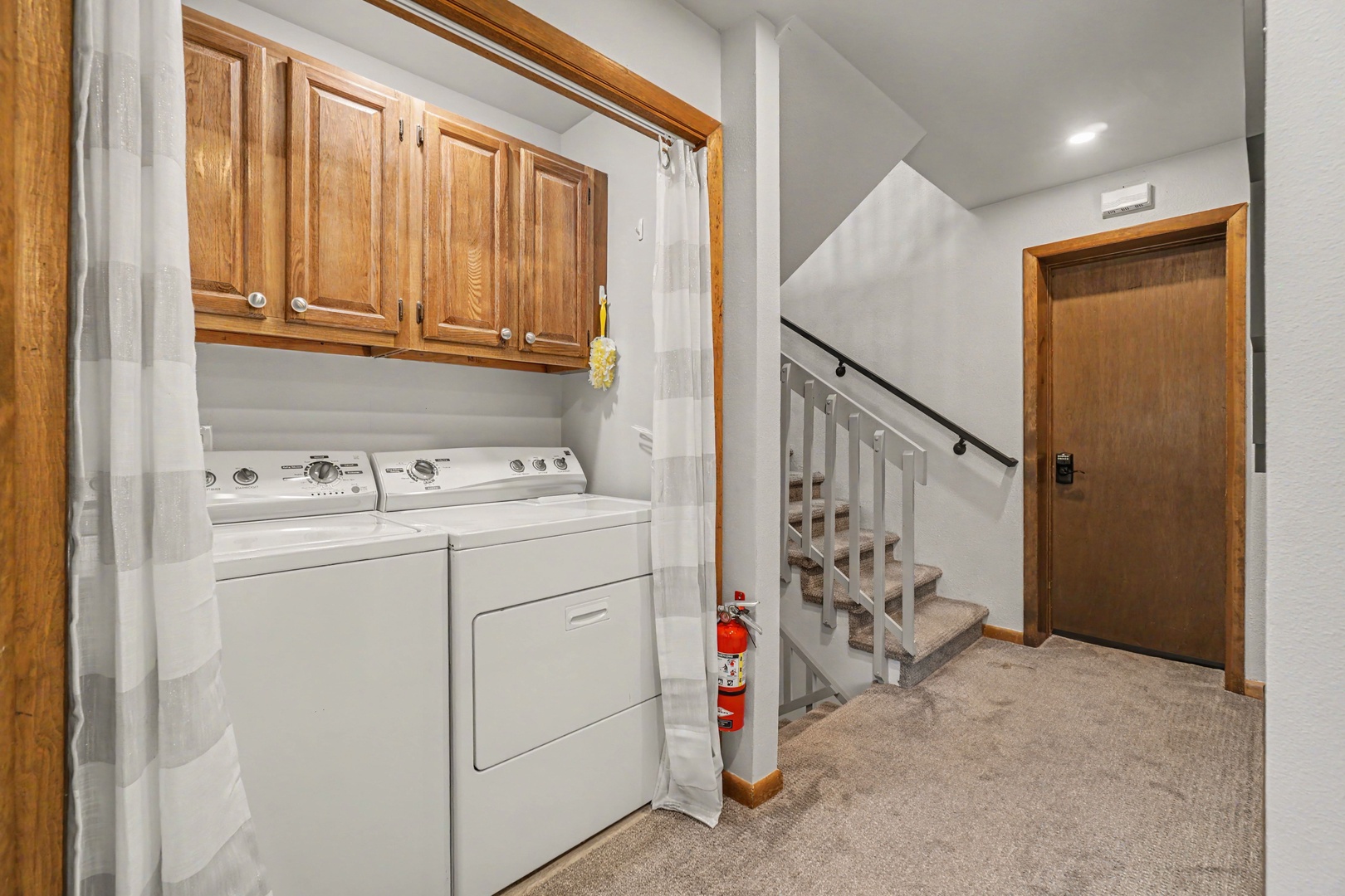 Your laundry essentials are neatly tucked away yet easily accessible on the mid-level.