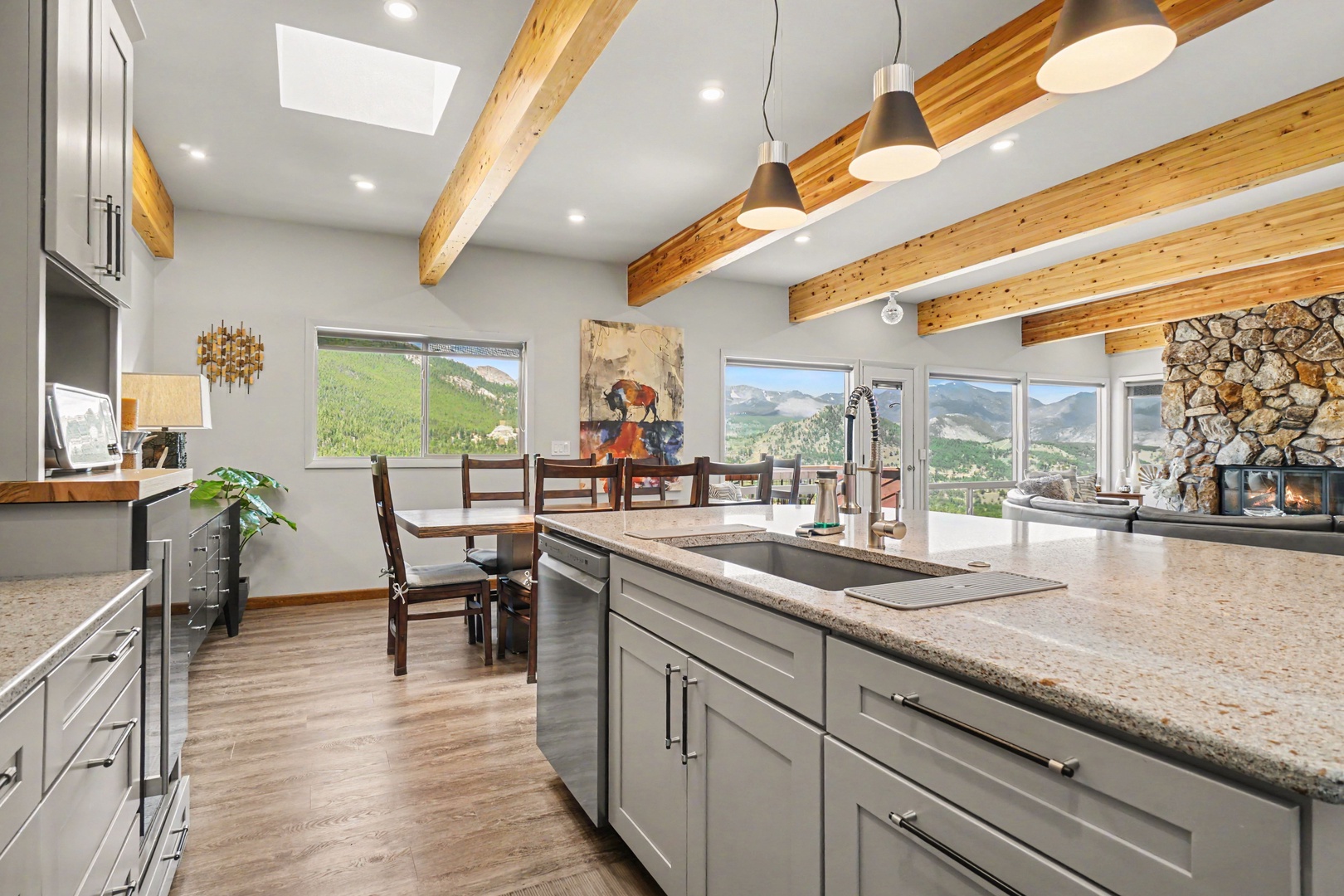 Craft delicious meals in this bright kitchen with panoramic mountain views.