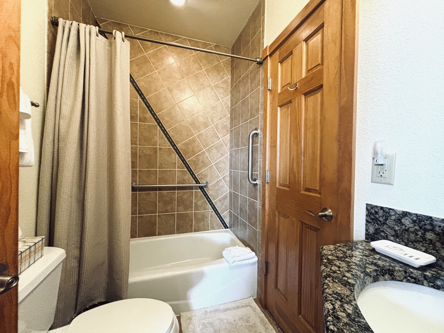 Bathroom has a tub/shower combo