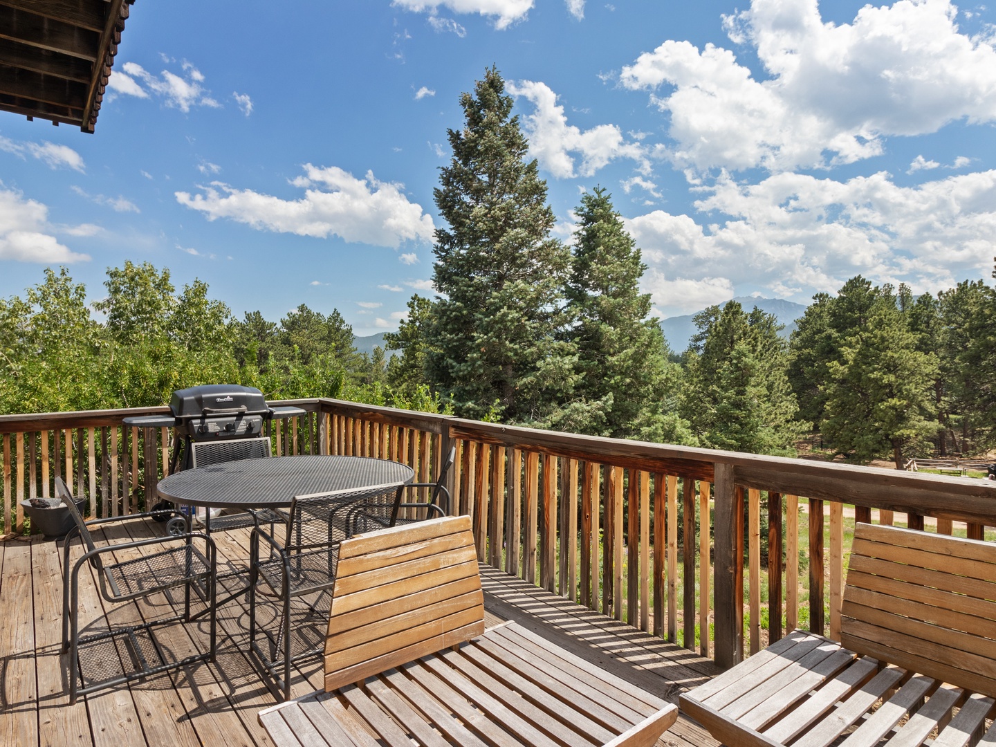 Savor morning coffee or evening barbecues on your private wooden deck with stunning views.