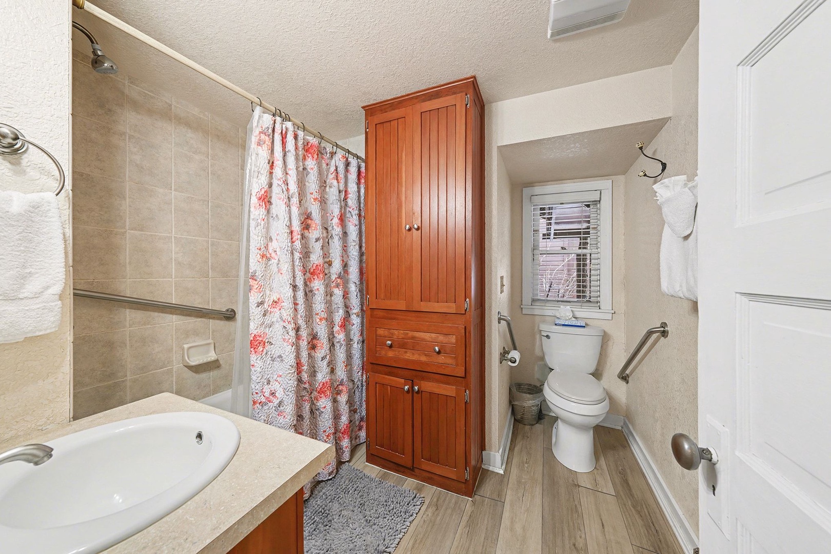 Your private bathroom features a relaxing shower-tub combo, and thoughtful storage to keep your essentials organized during your stay.