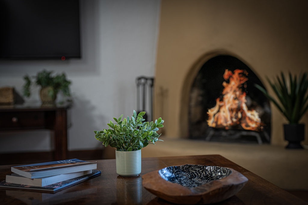 Cozy up by your crackling fireplace with a good book and watch flames dance in this inviting living space.