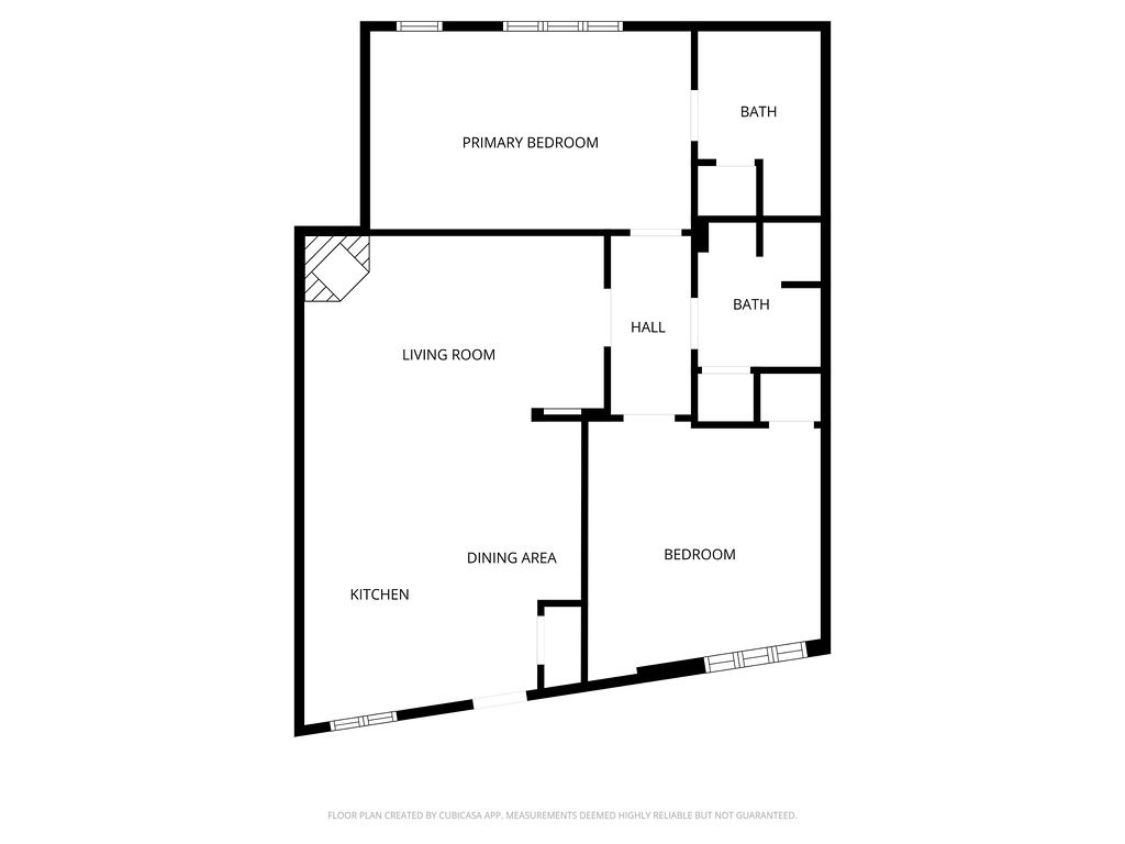 Clear floor plan shows your spacious two-bedroom layout with open living, dining area, full kitchen, and two bathrooms for comfortable stays.