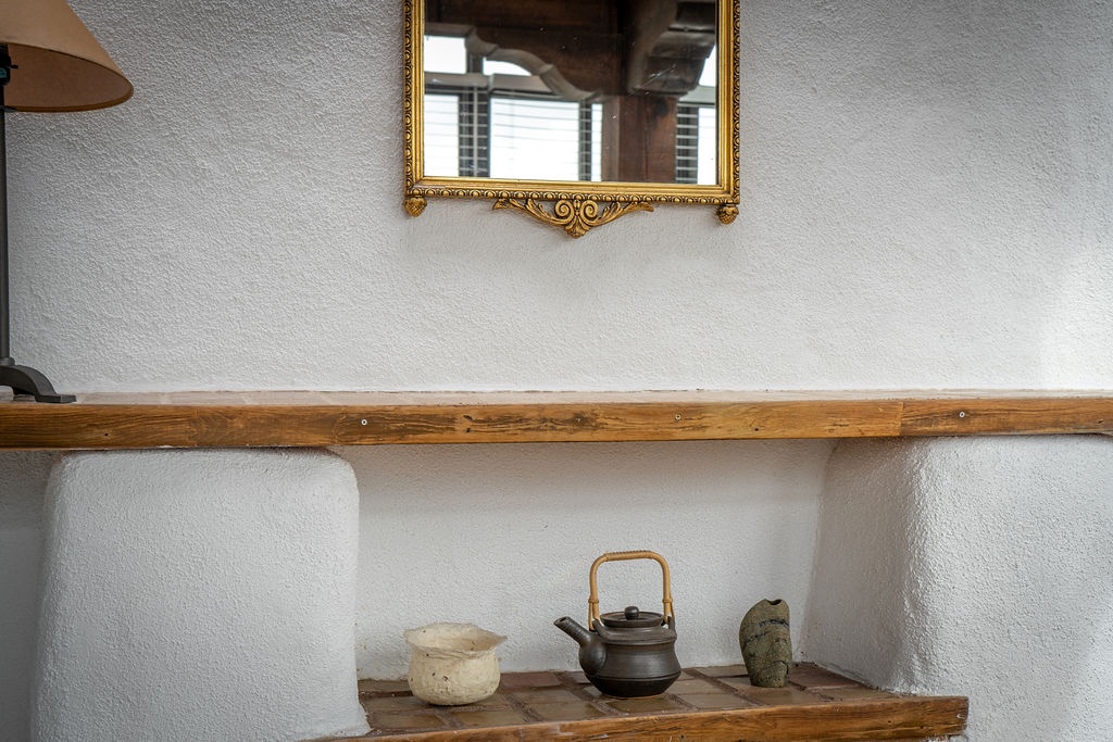 Unwind in your cozy living space with charming rustic details and thoughtful touches that create a warm, homey atmosphere.