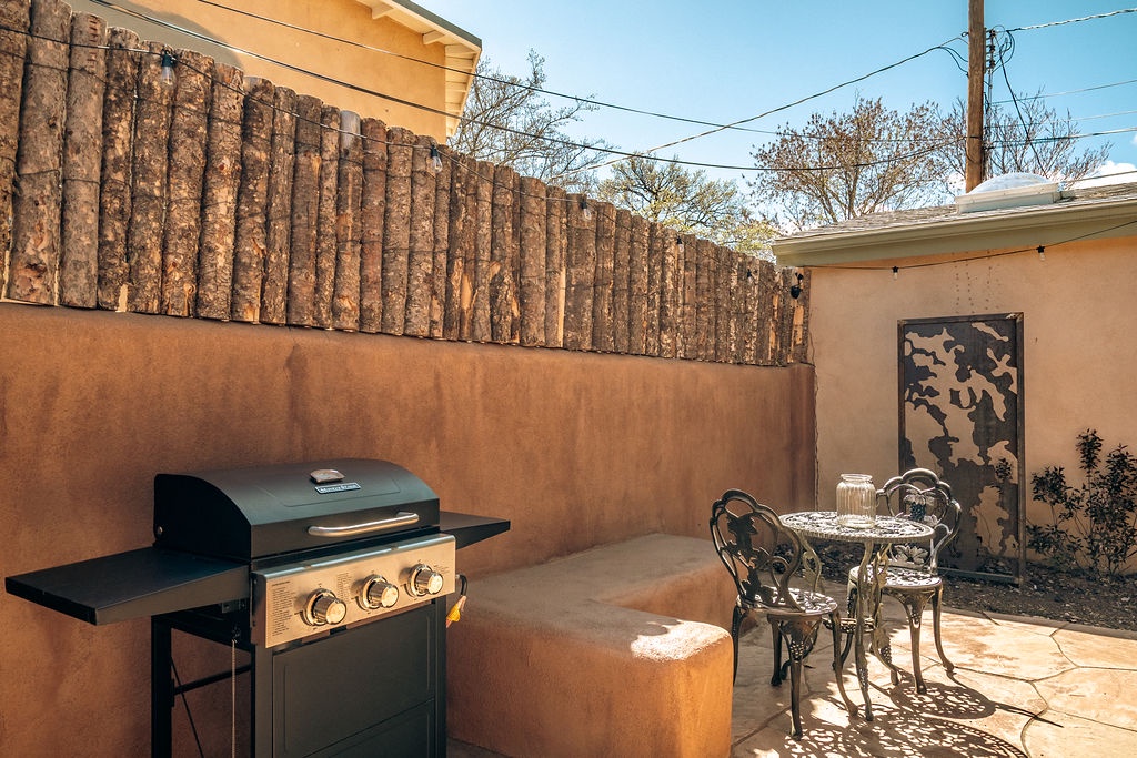 Your private patio beckons with warm adobe walls and a ready-to-use BBQ grill for sunset cookouts.