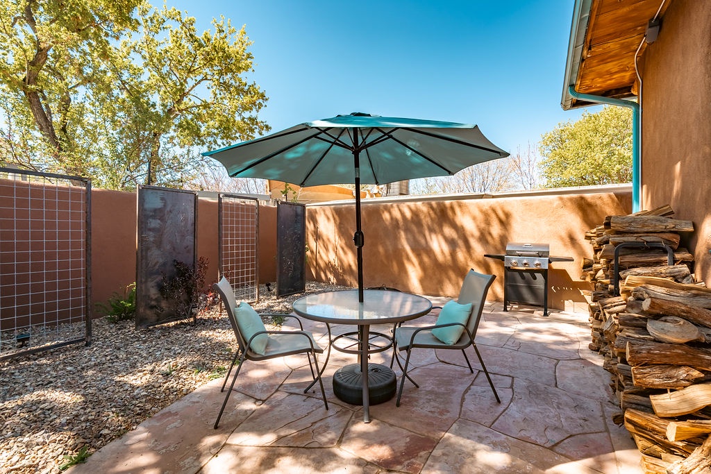 Step onto your private patio where shaded dining and BBQ await under desert skies, perfect for morning coffee or evening meals.