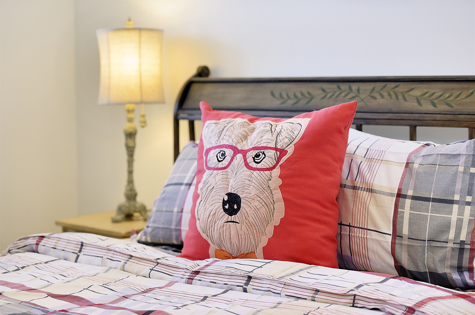 Sink into your cozy bed with playful pillows and soft plaid linens that make bedtime feel like a warm hug.